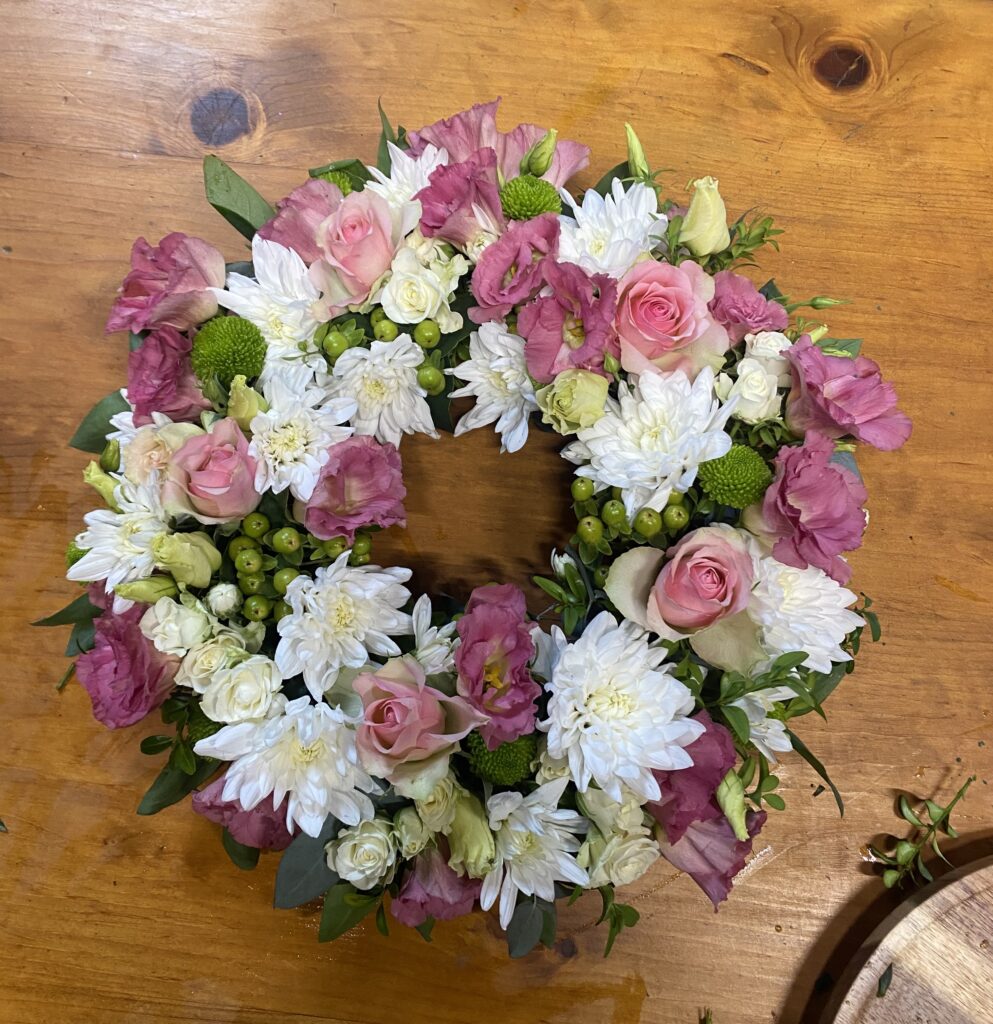 pink and white fresh flower wreath